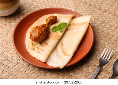 Dosa , Dosai, Ghee Roast With Chicken Curry Popular South Indian Breakfast Food, Kerala, Tamil Nadu India Sri Lanka. Masala Dosa With Non Vegetarian Indian Kadai Chicken Leg Curry.