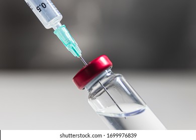 Dose Of Syringe Vaccine Vial For Flu Vaccine Drug, Coronavirus, Ebola, Hiv, Vaccination Medical Concept For Hypodermic Injection Treatment For Disease.