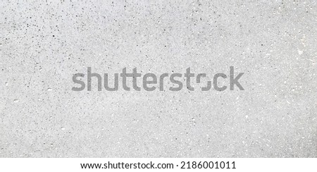 dotted gray stone texture background. grey natural porous stone texture, simple background wallpaper. abstract cement wall background and grunge texture.