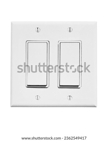 Double, 2 Light switch found on walls inside homes for turning on electric lights. Photographed on a white background.