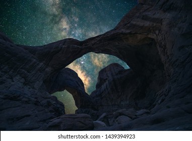 Double Arch In Arches National Park In Utah Under The Night Sky.