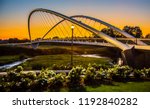 Double arch footbridge at sunset  from Salem Riverfront park to Minto Island, Oregon.