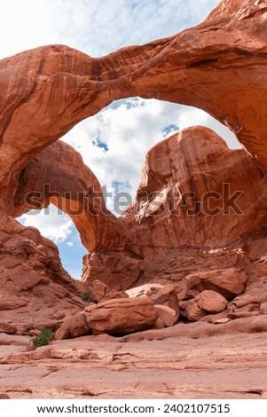 Double Arch Sandstone Rock Formation. The Windows Section Trail with Doble Arch, Natural Wonder in Arches National Park, Utah, United States.