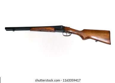 Double Barrel Shotgun, Side by Side Gun with Blued Barrels and Wooden Stock on White Background