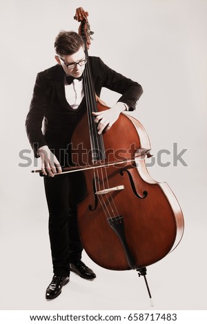 Double bass player playing contrabass Classical musician bassist.