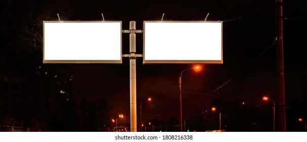 Double Billboard Lights Up At Night