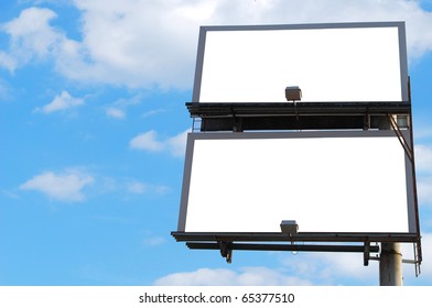 A Double Blank Billboard Against Blue Sky