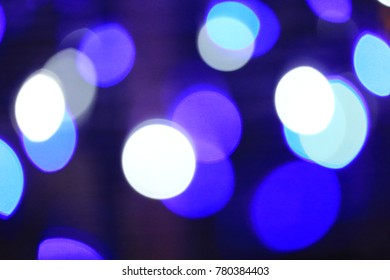 Double bokeh pattern in blue , Double bokeh and Picture blurred Christmaslight pattern colours New 2025 on dark background:Use for website and banner, backdrop.