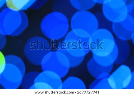 Double bokeh pattern in blue,Double bokeh and Picture blurred Christmaslight pattern colours New 2026 on dark background:Use for website and banner, backdrop.