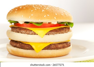 Double Cheese Burger On The White Plate