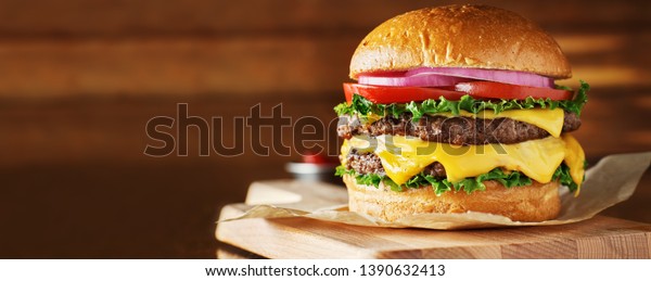 double cheeseburger\
with lettuce, tomato, onion, and melted american cheese with\
panoramic composition