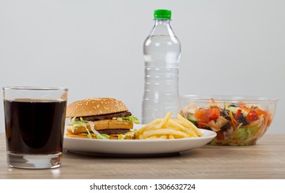 Double Cheeseburger With Potato Fries And Coke Vs Healthy Chicken & Vegetable Salad And Still Water. Which One To Choose?