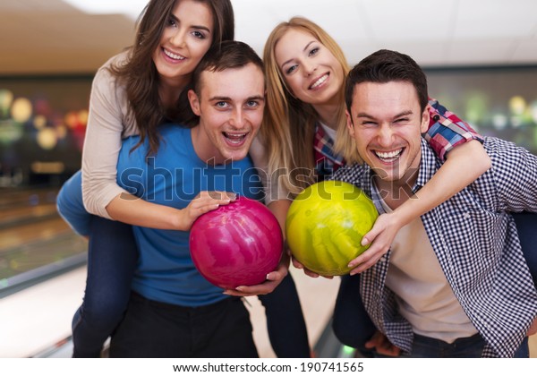 Double date at bowling alley
