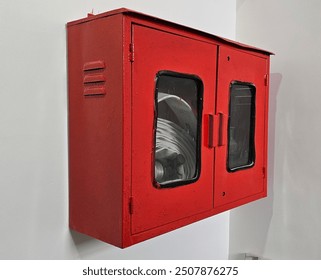 Double door fire hose red box, extinguisher equipment for buildings - Powered by Shutterstock