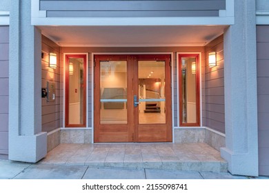 Double Door With Glass And Wood Frames Of A Modern Apartment Building At San Francisco, CA