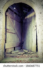 Double Door Of A Stable That Allows Access To Two Different Rooms With A Single Entrance