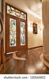 double doors with stained glass