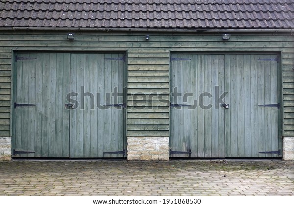 Double Doors of a\
Stone and Wood Barn\
Building
