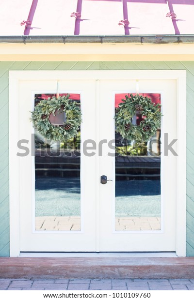 Double Doors Wreaths Stock Photo Edit Now 1010109760