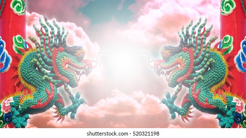 Double dragon in the sky background with cloud and sun falre.