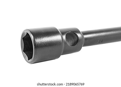 Double Ended Black Wheel Nut Wrench, Reinforced, Size 32x33 Millimeters Isolated On A White Background, Close-up