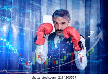 Double Exposer Businessman With Boxing Glove Ready Fighting Economy Crisis For Corporate Battle In Business For Successful With Diagram Graph Investment Is Business Fighter Concept