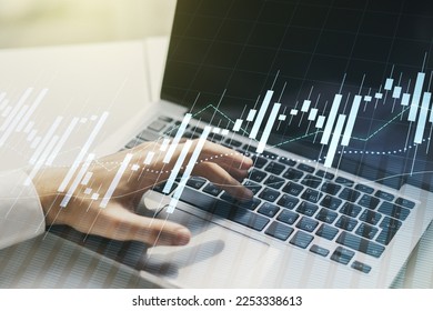 Double exposure of abstract creative financial diagram with hand typing on computer keyboard on background, banking and accounting concept - Shutterstock ID 2253338613