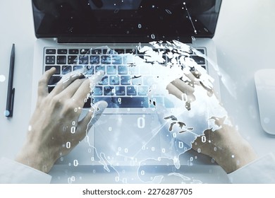 Double exposure of abstract creative programming illustration with world map and hand typing on laptop on background, big data and blockchain concept
