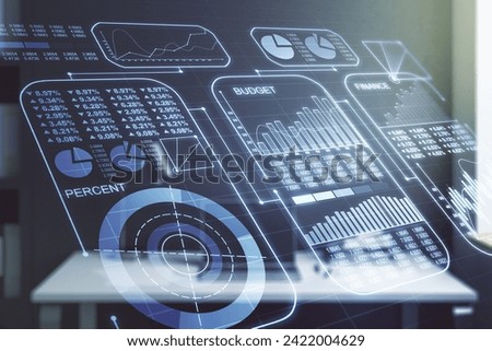 Double exposure of abstract creative statistics data hologram and modern desk with computer on background, analytics and forecasting concept