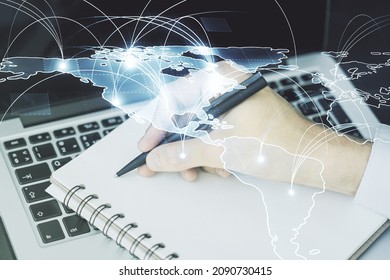 Double Exposure Of Abstract Digital World Map With Connections And Hand Writing In Notepad On Background With Laptop, Big Data And Blockchain Concept