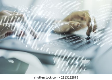 Double exposure of abstract digital world map with connections and hands typing on laptop on background, research and strategy concept