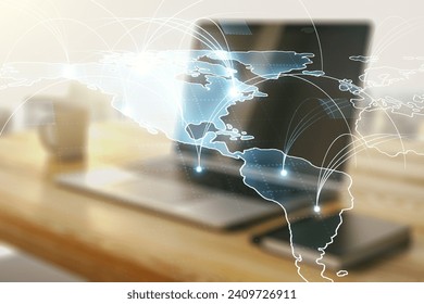Double exposure of abstract digital world map with connections and modern desk with computer on background, big data and blockchain concept