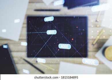 Double exposure of abstract programming language hologram and digital tablet on background, top view, research and development concept