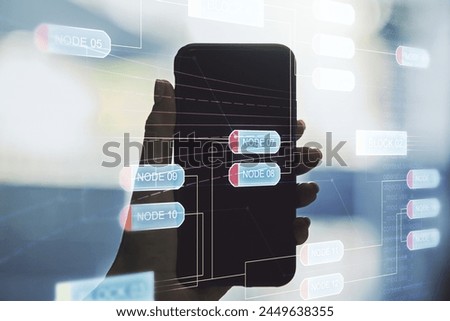 Double exposure of abstract programming language hologram and hand with cell phone on background, research and development concept