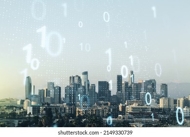 Double exposure of abstract virtual binary code hologram on Los Angeles city skyscrapers background. Database and programming concept