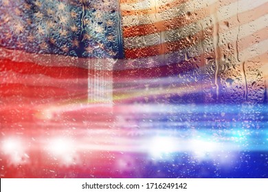 Double exposure of American flag and police cars on street at night - Shutterstock ID 1716249142