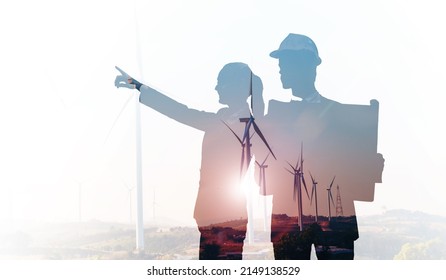 Double Exposure Architecture Engineering Windmill Power Eco Energy Concept, Asian Business Partner Collaboration Architect Holding Blueprint Planning Development  Building Renewable Energy Landscape