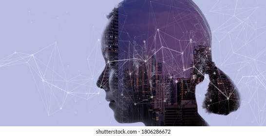 Double Exposure Of Asian Woman Silhouette And Modern Renewable City Skyline Background.Energy Digitalization Concept.