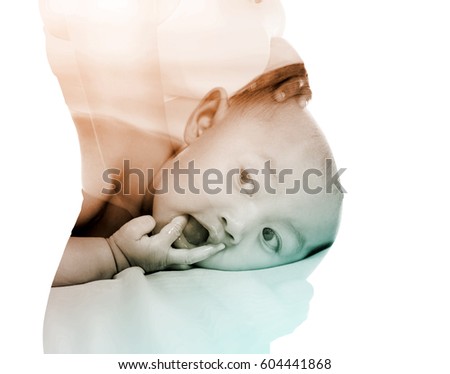 Similar – Newborn lying on bed embraced by her mother