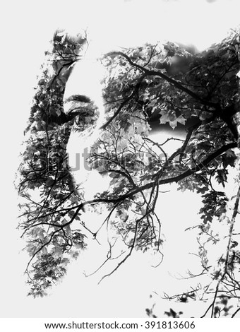 Double exposure of beautiful girl and leaves black and white