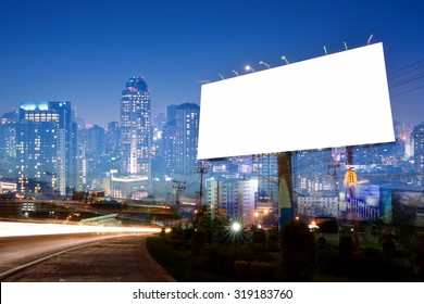 Double Exposure Of Blank Billboard On City Night 