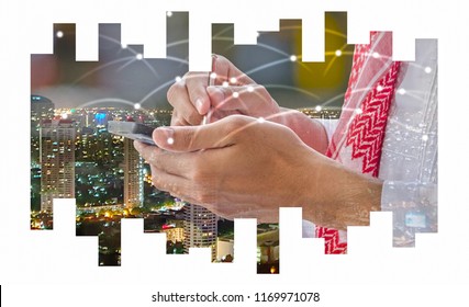 Double Exposure Of Business  Arab Man Writing On Smart Phone Screen,night City Scape And Network Sign Background,selective Focus.