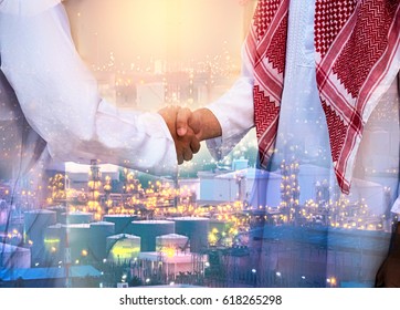 Double Exposure Of Business Handsome Arab Man Hand Shake And Oil Refinery Background