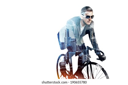 Double Exposure Of Business Man On A Bicycle And City