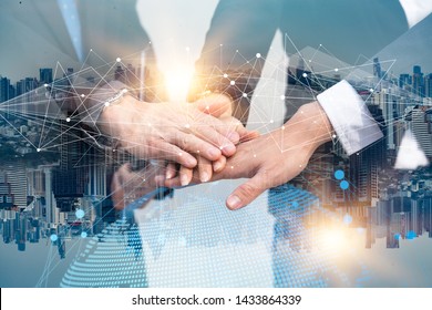 Double exposure Business people of Marketing team with a Partnership greeting power tag team,Teamwork Join Hands Partnership Concept after complete deal,Successful Teamwork Partnership in the city. - Shutterstock ID 1433864339