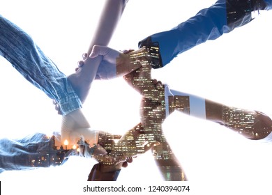 Double Exposure Business  Success Team Which Hand Of The Work Force Combine Power Tag Team With Light And Group Of Diversity People Hand Assembly High Five Together For Good Teamwork.