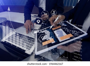 Double exposure of business teamwork or business partners discussing and meeting at the modern office desk, Financial graph interfaces icons, Marketing workplace strategy concept, blurred background.