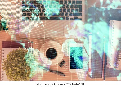 Double Exposure Of Business Theme Hologram Over Desktop With Phone. Top View. Mobile International Trade Connection Concept.