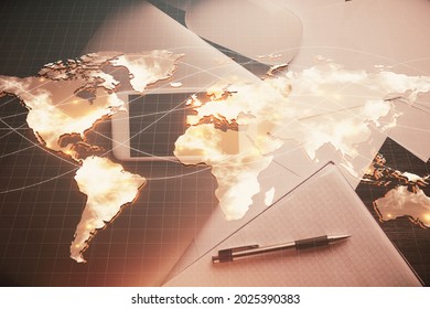 Double Exposure Of Business Theme Hologram Over Desktop With Phone. Top View. Mobile International Trade Connection Concept.