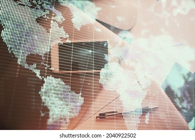 Double Exposure Of Business Theme Hologram Over Desktop With Phone. Top View. Mobile International Trade Connection Concept.